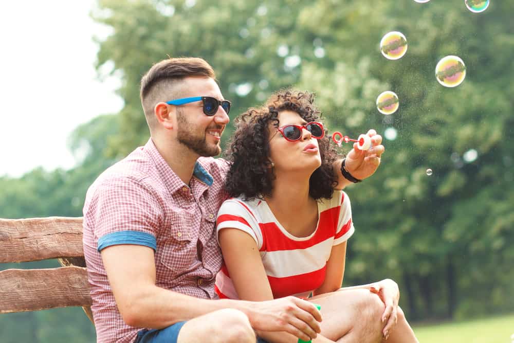 Dating rules. Cliche dating profiles. Dating Rules Switzerland. 20 Dating cliches. Young couple on Waterfront blowing Bubbles.