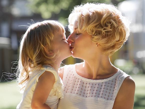 children kissing on the lips