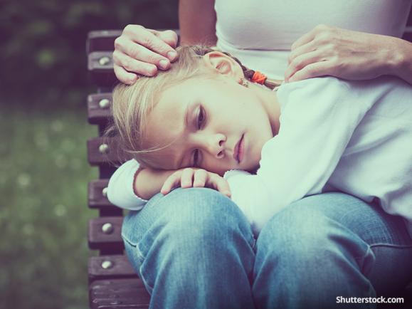 sad girl with mother