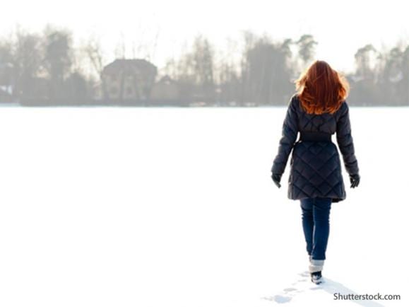 woman walking winter cold