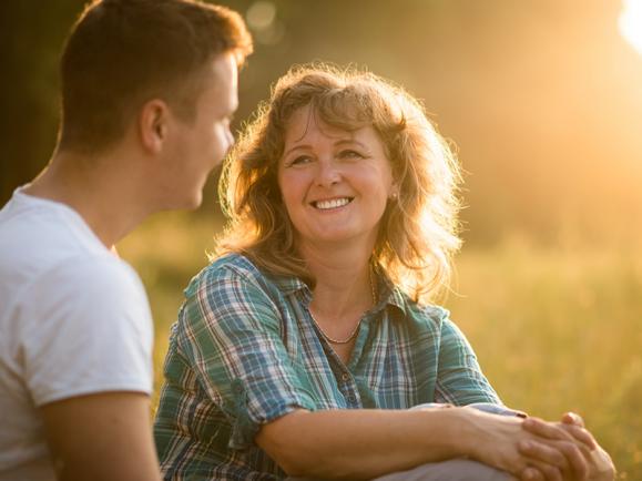 Mother talking to her son